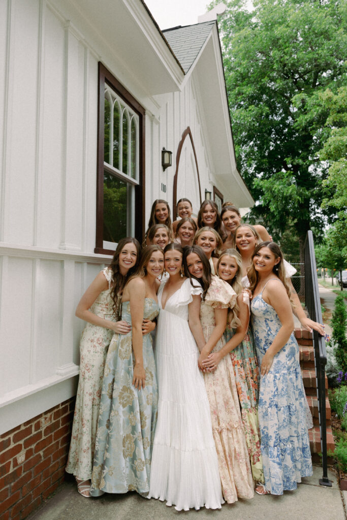 Bride and Bridesmaids standing in front of church